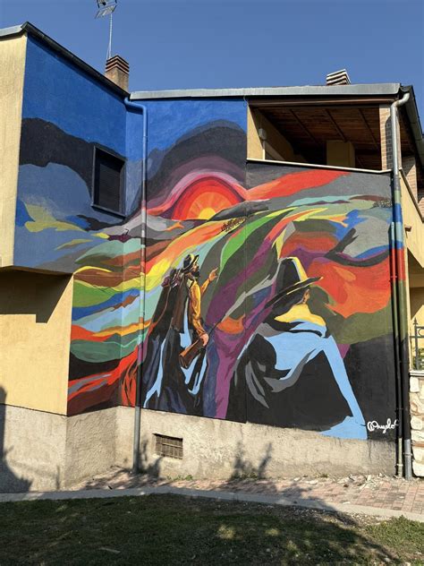 Murales colorati sulle facciate delle case nel quartiere Getsemani