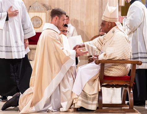 Thematic photo of a young priest during ordination