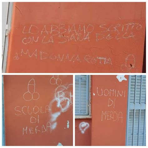 Scritte sui muri di una scuola con frasi di protesta