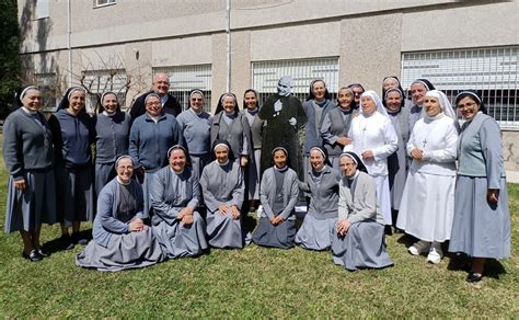 Don Orione con giovani seminaristi (foto d'epoca)