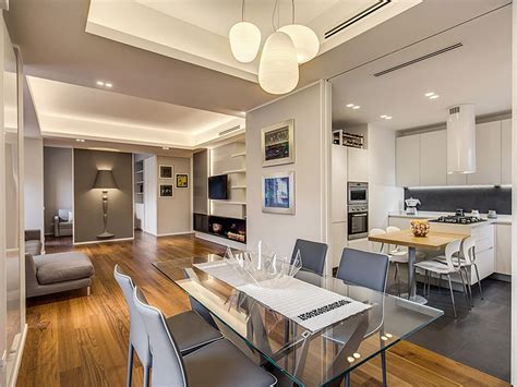 Interno di un appartamento moderno della Montalbino House con cucina e zona giorno