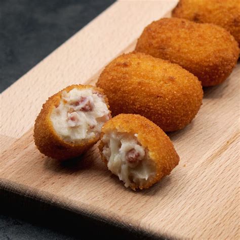 Tris di parmigiane e croqueta de jamon de La Spelunca