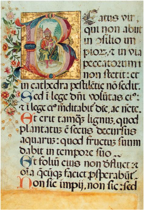 Dettaglio di una pagina miniata di un manoscritto medievale con iniziali decorate
