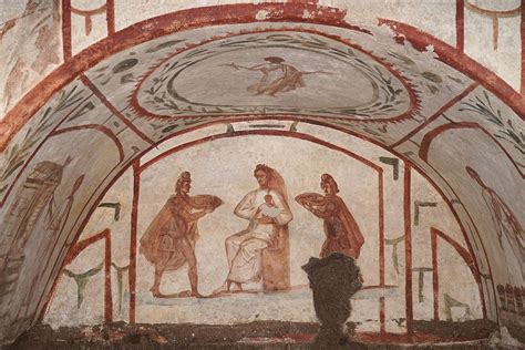 Affresco paleocristiano con una figura femminile che allatta un bambino, Catacombe di Priscilla, Roma