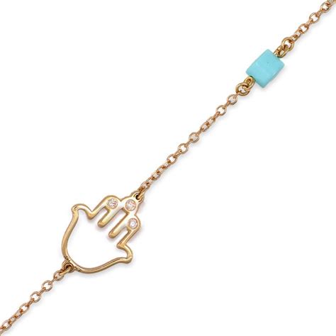 Bracciale con ciondolo a Mano di Fatima in oro e diamanti