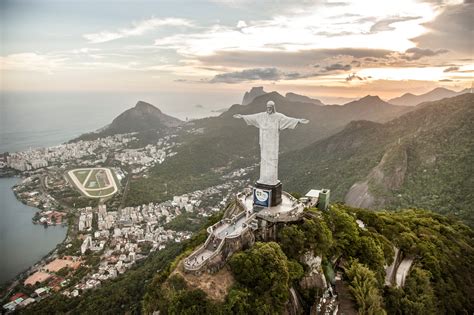 Thematic photo of the Christ the Redeemer statue in Rio de Janeiro with outstretched arms