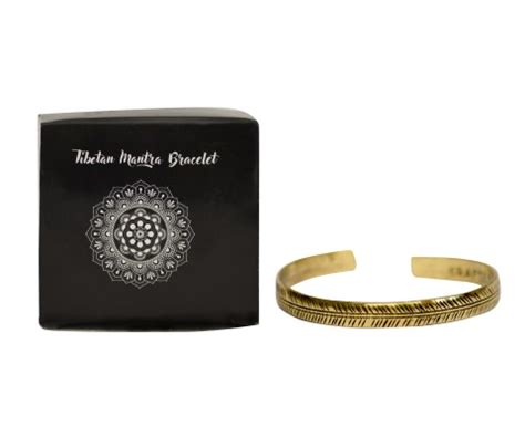 Braccialetti tibetani in ottone con incisioni simboliche e diverse fantasie