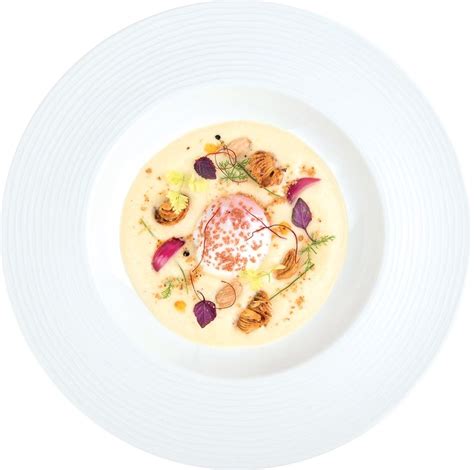 Uovo cotto a bassa temperatura, spuma di fieno e camomilla, bianco d’Alba e fonduta di bitto - piatto del Gallo Cedrone