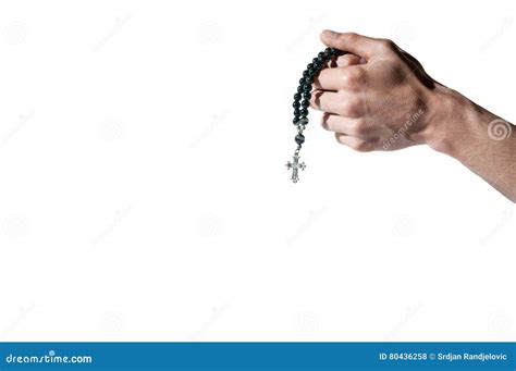 Mano che prega con un rosario