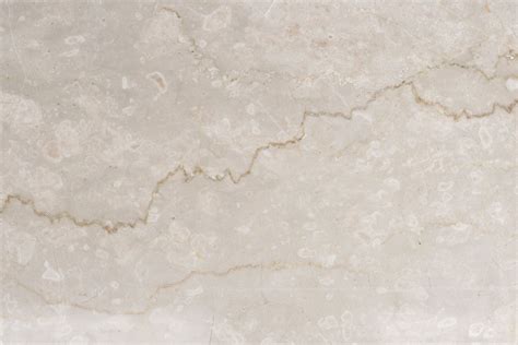 Vista ravvicinata del marmo botticino utilizzato per la costruzione del Vittoriano.