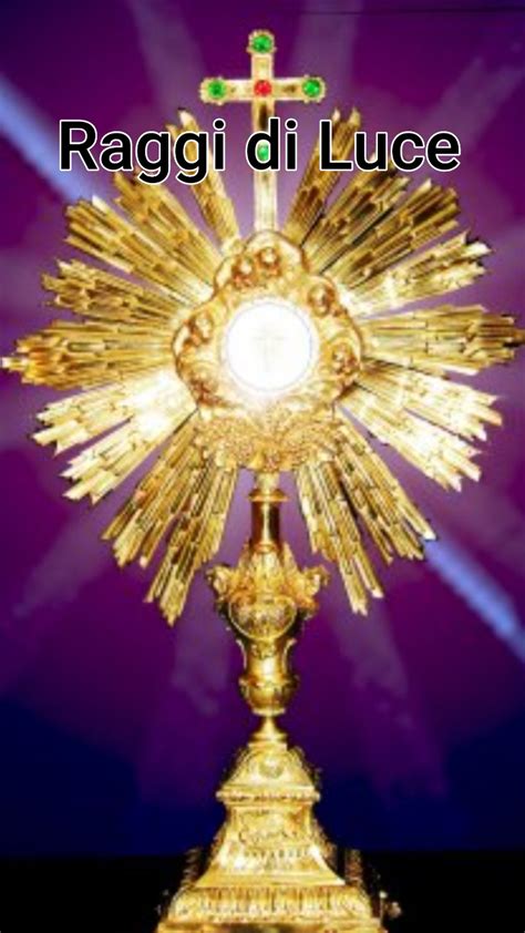 Gesù Eucaristia con raggi di luce