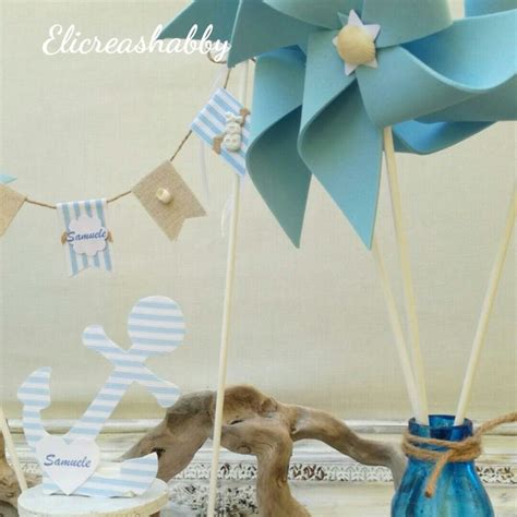 Decorazione battesimo a tema marino con barchette e conchiglie