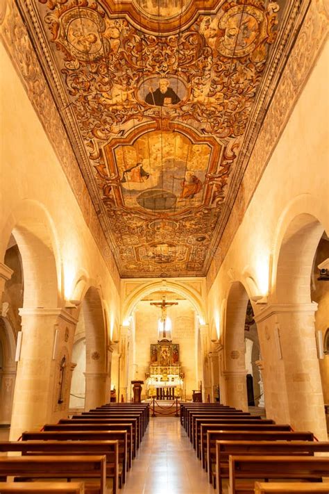 Interior view of the Chiesa di San Francesco with its wooden altar and sculptures