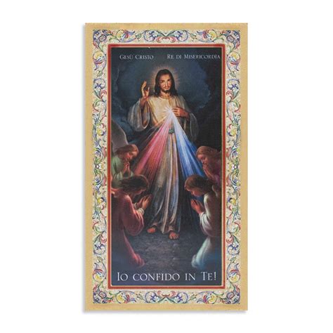Persona in preghiera davanti all'immagine di Gesù Misericordioso
