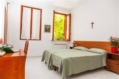 Interno di una camera di Casa Il Rosario o area comune con servizi