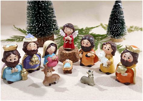 Thematic photo of mini nativity sets in magenta color