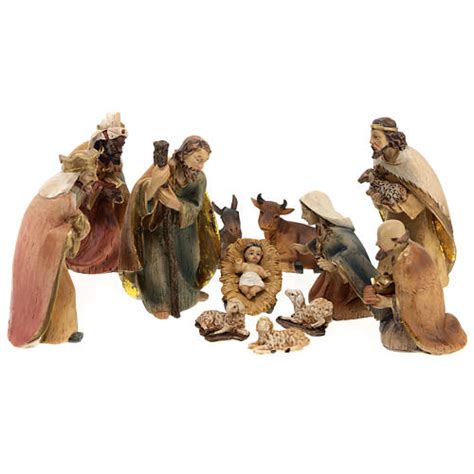 Presepe intagliato in legno d'olivo, dettagli della Sacra Famiglia con Re Magi