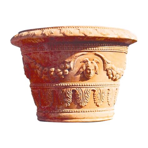 Dettaglio di vasi in terracotta di Caltagirone con simboli eucaristici e decorazioni floreali.