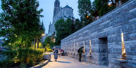 Photo of pilgrims bathing in the pools of Lourdes
