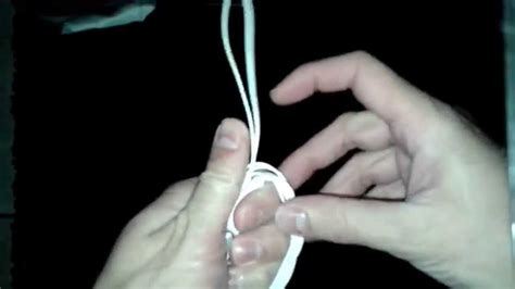 schema macro dei passaggi per avvolgere il filo d'argento attorno all'asola (wrapped loop)