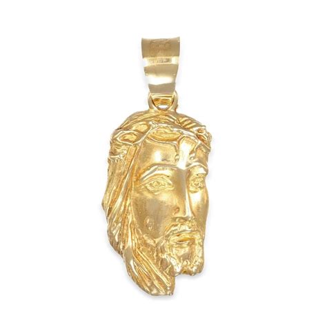 Collana unisex con ciondolo di Gesù Cristo in oro giallo 18 carati su sfondo neutro