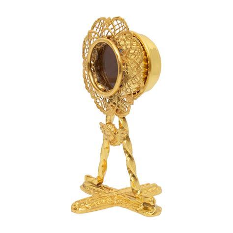 Reliquiario ornato con gemme e filigrana d'oro