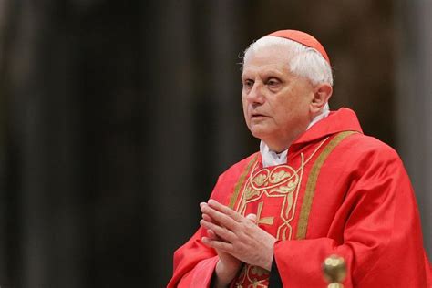 Thematic photo of Cardinal Joseph Ratzinger writing, with a subtle background suggesting spiritual reflection.