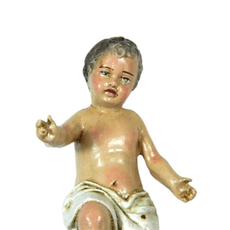 dipinto rinascimentale di Gesù Bambino che tiene in mano un melograno