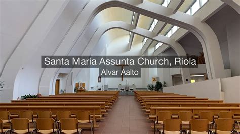 Interno della Chiesa di Santa Maria Assunta di Riola, con enfasi sul sistema di illuminazione