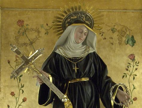 Rappresentazione iconografica classica di Santa Rita con i simboli della rosa e della spina