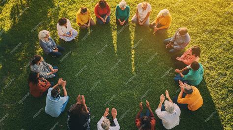 Group of people in a prayer circle, emphasizing community and shared wisdom