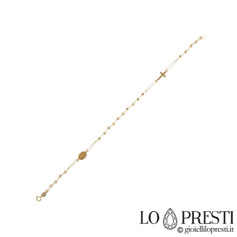 Immagine di un bracciale rosario in oro giallo 18kt con perle e croci