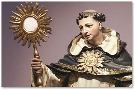 San Tommaso d'Aquino in contemplazione eucaristica, con un raggio di luce divina