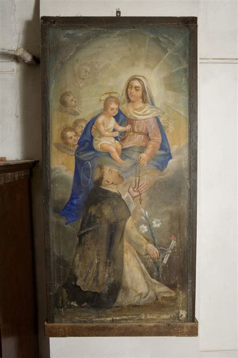Illustrazione storica dell'origine del rosario o San Domenico con il rosario