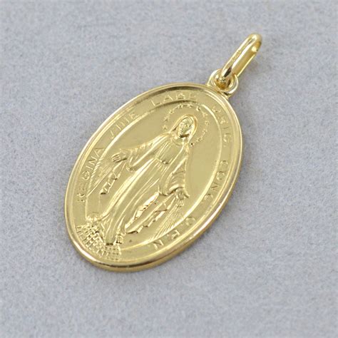 Ciondolo in oro giallo con medaglia raffigurante la Madonna Miracolosa