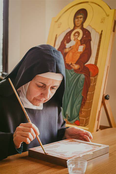 Monache al lavoro nell'orto o in un laboratorio artigianale del monastero