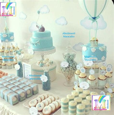 Tavolo decorato per battesimo con torta e palloncini