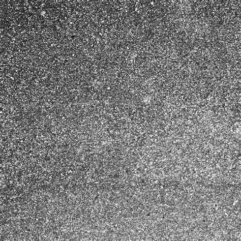 Foto ravvicinata dei dettagli del cemento della vela, evidenziando gli effetti del tempo