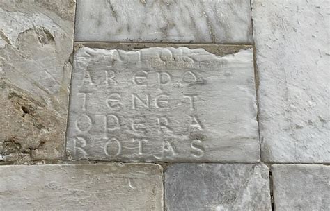 Dettaglio del Quadrato Magico del Sator sulla facciata della chiesa