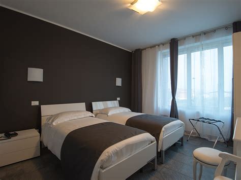 Foto di una camera doppia con arredi tradizionali dell'Hotel Giubileo