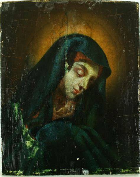 Ritratto ravvicinato del volto della Vergine Annunziata che mostra la luce radente e l'espressione dolce