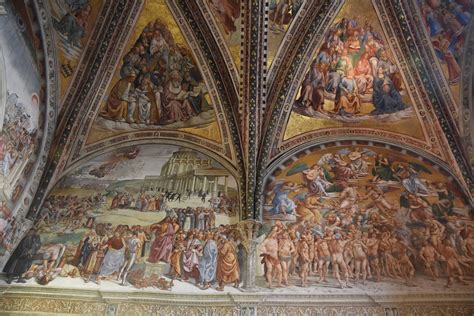 Affresco del XIV secolo nel Duomo di Cremona: San Michele nella duplice azione di pesatore delle anime e uccisore del male