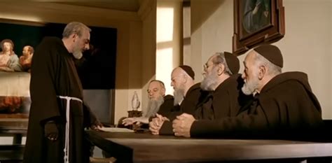 Scena che illustra l'incontro tra Padre Pio e Carlo, con la frase