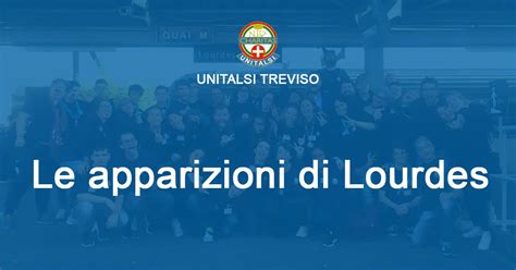 Foto di gruppo di pellegrini Unitalsi con volontari a Lourdes