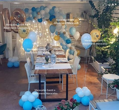 Allestimento della festa in riva al mare con dettagli vintage e decorazioni per bambini