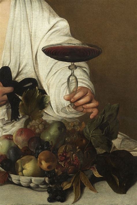 Dettaglio fotografico del Bacco di Caravaggio con focus sulla natura morta nel calice