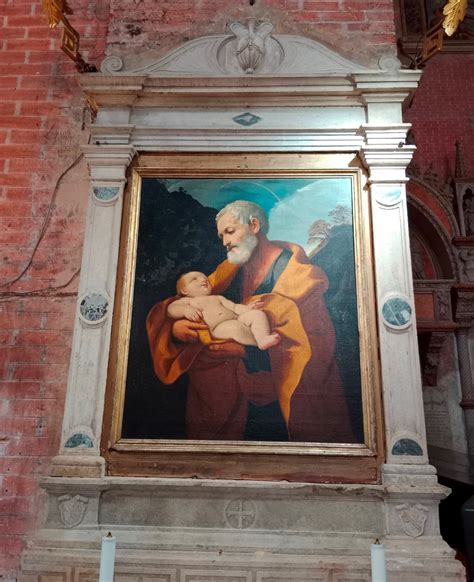 Illustrazione di Gesù bambino che aiuta Giuseppe nella bottega