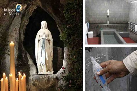 Pellegrini alle fontane di Lourdes per attingere l'acqua