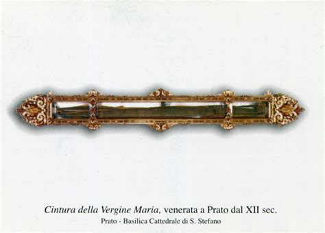 scultura medievale di san Tommaso che riceve la cintola della Vergine