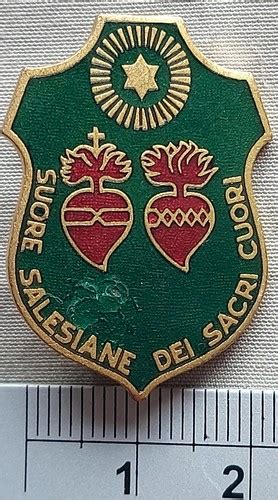 Immagine dello stemma delle Suore Piccole Operaie dei Sacri Cuori